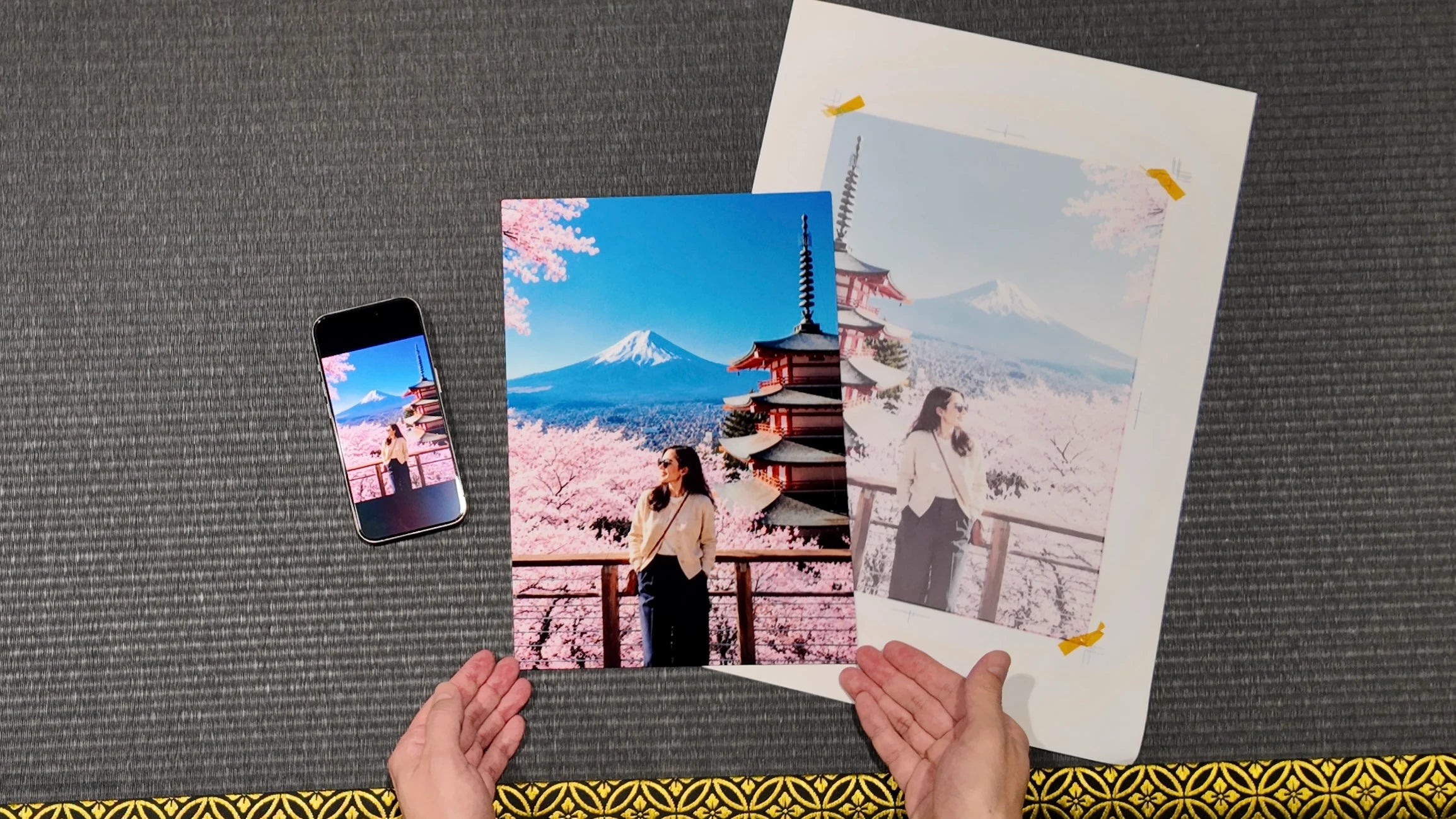 A finished Japan travel metal artwork being checked against the original photo